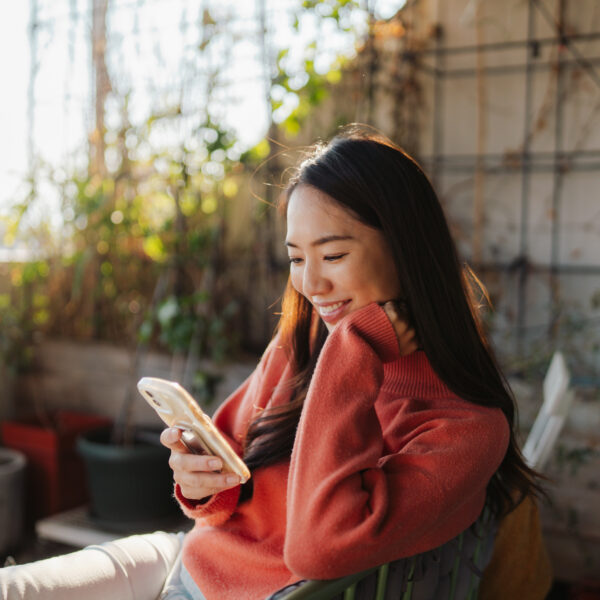 Young woman using mobile phone